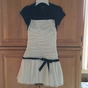 Girl’s size 10 cream colored dress.